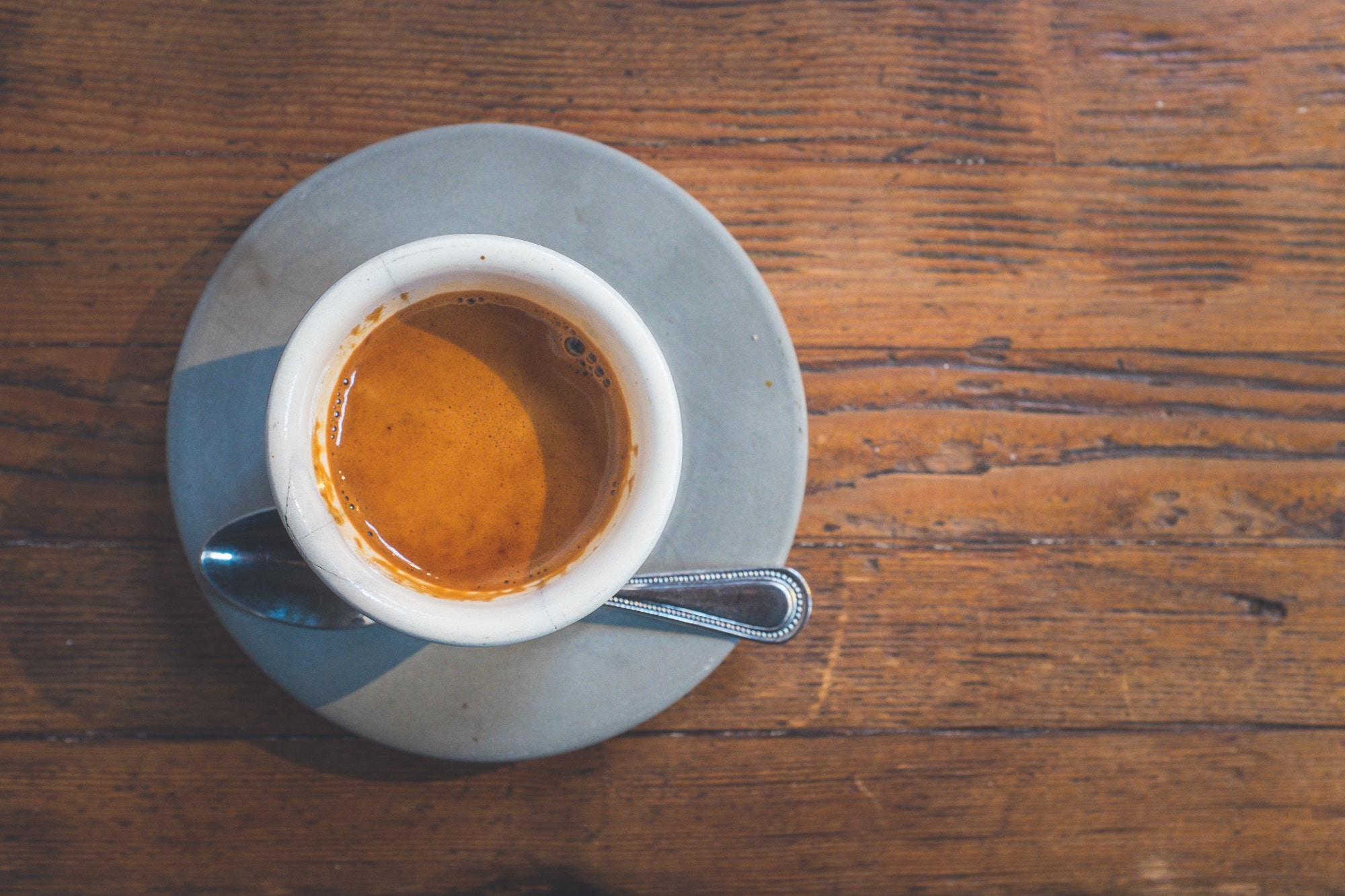 A cup of black coffee viewed from above